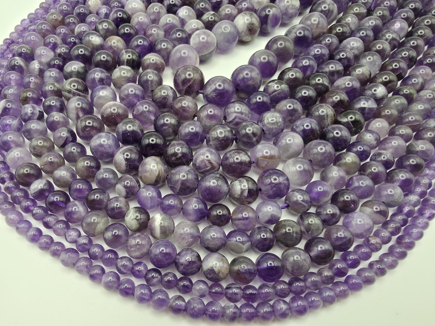 Amethyst Round beads AAA Grade Deep Purple - 15.5" Strand