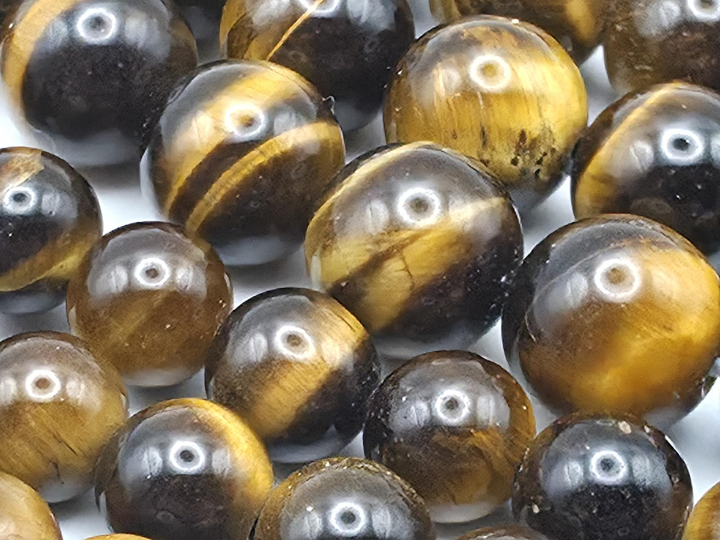 Tiger's Eye Round beads AAA+ Grade, Golden Brown - 15.5" Strand