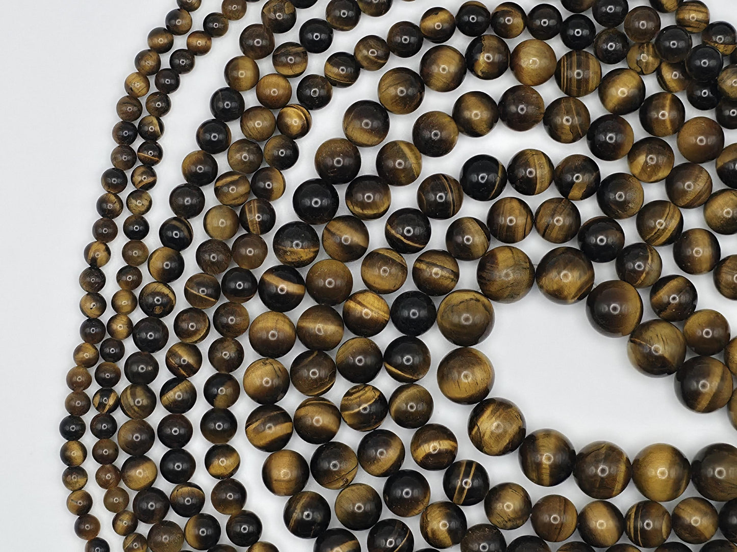 Tiger's Eye Round beads AAA+ Grade, Golden Brown - 15.5" Strand