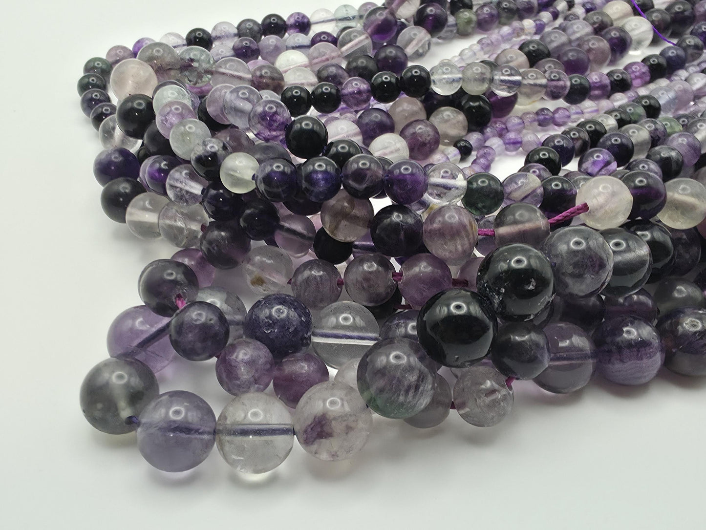 Fluorite Round beads AAA Grade - 15" Strand